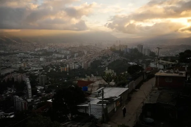  The sun rises in Caracas, Venezuela, Saturday, Jan. 10, 2026, a week after US forces captured Venezuelan President Nicolas Maduro. (AP) 