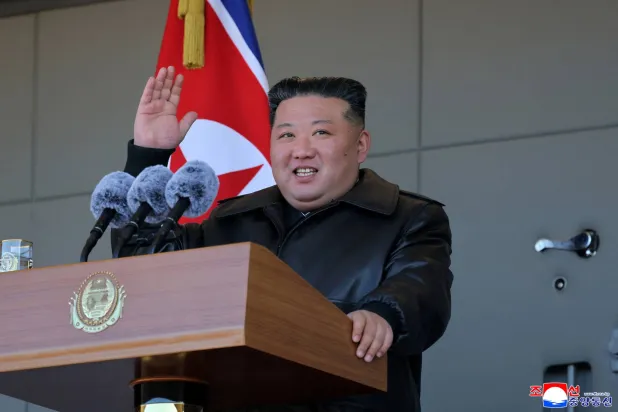 North Korean leader Kim Jong Un gestures as he visits a greenhouse farm construction site along the country's border with China, in North Korea, January 2, 2026, in this picture released by North Korea's official Korean Central News Agency.  KCNA via REUTERS   