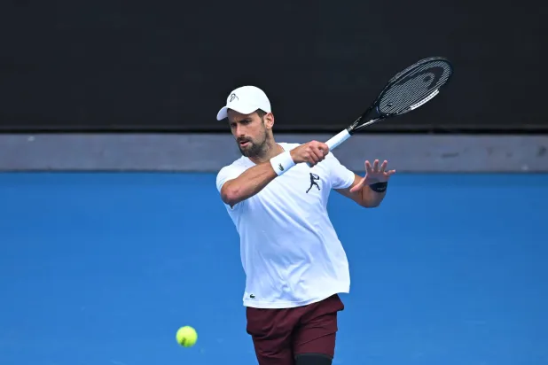 13 January 2026, Australia, Melbourne: Serbian tennis player Novak Djokovic in action during a practice session ahead of the Australian Open tennis tournament at Melbourne Park. (dpa)
