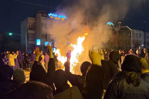  In this photo obtained by The Associated Press, Iranians attend an anti-government protest in Tehran, Iran, Friday, Jan. 9, 2026. (UGC via AP)