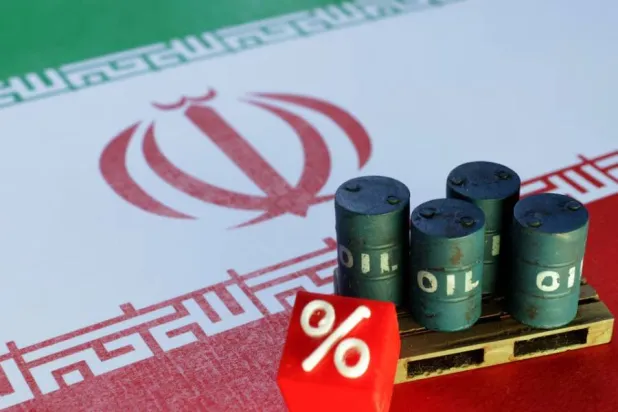 The Iranian flag and 3D printed oil barrels miniature are seen in this illustration taken June 23, 2025. (Reuters)