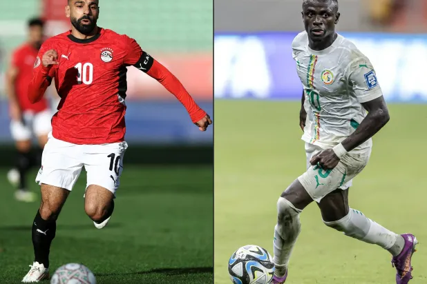 صلاح وماني تتشابه مسيرتهما في النجومية العالمية أو المشروعات الإنسانية (أ.ف.ب)