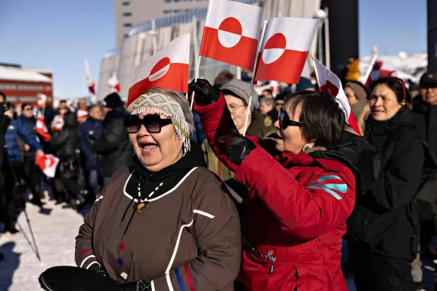 (FILES) Protesters attend a march to the US consulate during a demonstration, under the slogan 'Greenland belongs to the Greenlandic people', in Nuuk, Greenland, on March 15, 2025.  (Photo by Christian Klindt Soelbeck / Ritzau Scanpix / AFP)