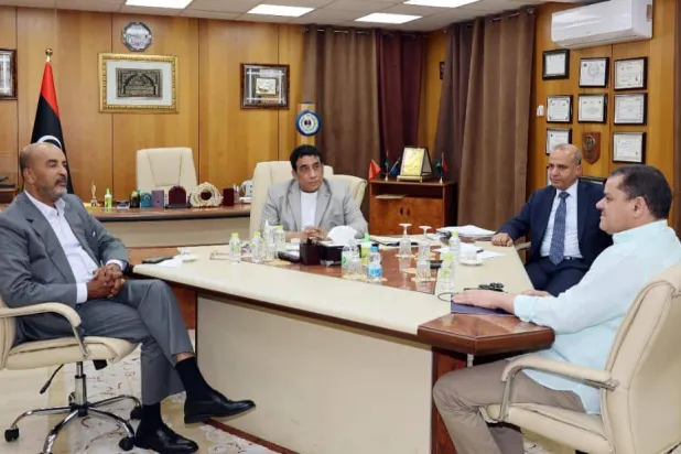 المنفي يتوسط اللافي والدبيبة (يمين) والكوني 21 سبتمبر الماضي (المجلس الرئاسي الليبي)