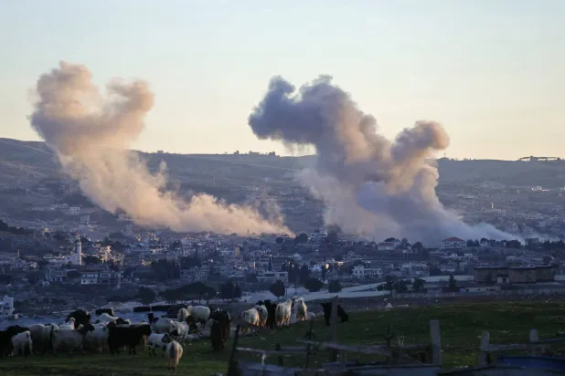 Smoke rises from the site of an Israeli airstrike that targeted the village of Sohmor, in southern Lebanon on January 15, 2026. (Photo by Rabih DAHER / AFP)