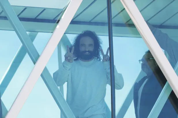 A migrant participating in the government's program Great Mission Return to the Homeland, waves upon arrival at Maiquetia International Airport, in Venezuela 16 January 2026. EPA