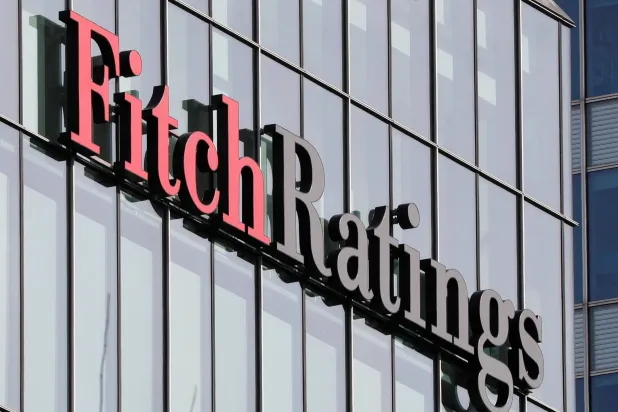 FILE PHOTO: The Fitch Ratings logo is seen at their offices at Canary Wharf financial district in London,Britain, March 3, 2016. REUTERS/Reinhard Krause/File Photo