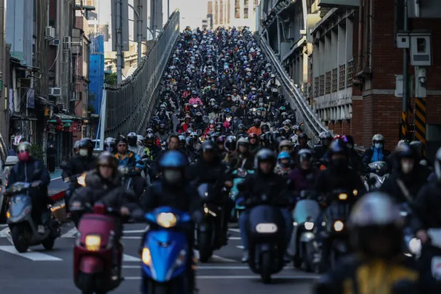 Motorists maneuver at the street in Taipei, Taiwan, 14 January 2025. EPA/RITCHIE B. TONGO