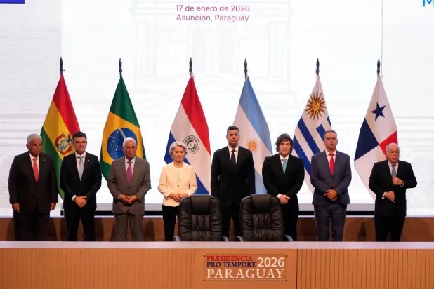 Panama's President Jose Raul Mulino, from left, Bolivian President Rodrigo Paz, European Council President Antonio Costa, European Commission President Ursula von der Leyen, Paraguay's President Santiago Pena, Argentina's President Javier Milei, Uruguay's President Yamandu Orsi and Brazilian Minister of Foreign Affairs Mauro Vieira, pose for a group photo during a meeting to sign a free trade deal between the European Union and Mercosur in Asuncion, Paraguay, Saturday, Jan. 17, 2026. (AP Photo/Jorge Saenz)