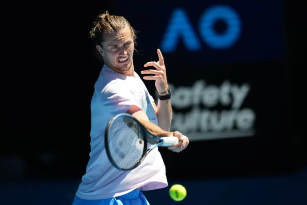 Alexander Zverev of Germany plays a forehand return during a practice session ahead of the Australian Open tennis championship in Melbourne, Australia, Saturday, Jan. 17, 2026. (AP Photo/Dita Alangkara)