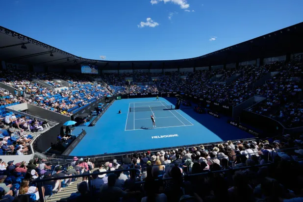  Sebastian Korda of the US serves compatriot Michael Zheng during their first round match at the Australian Open tennis championship in Melbourne, Australia, Sunday, Jan. 18, 2026. (AP) 