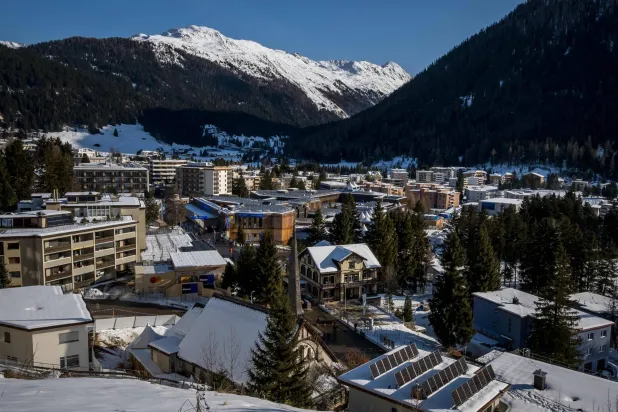 This photograph taken on January 18, 2026 shows a view of the Alpine resort of Davos with the Congress Center that will host the World Economic Forum (WEF) annual meeting. (Photo by Fabrice COFFRINI / AFP)