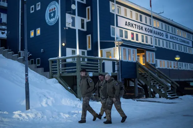 Danish soldiers walk in front of Joint Arctic Command in Nuuk, Greenland, January 16, 2026. REUTERS/Marko Djurica