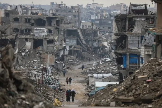 İsrail'in Gazze Şeridi'ne düzenlediği hava saldırılarının yol açtığı yıkımdan (DPA)