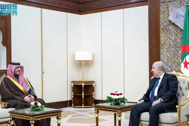 Algerian President Abdelmadjid Tebboune and Saudi Minister of Interior Prince Abdulaziz bin Saud bin Naif bin Abdulaziz meet in Algiers on Monday. (SPA)