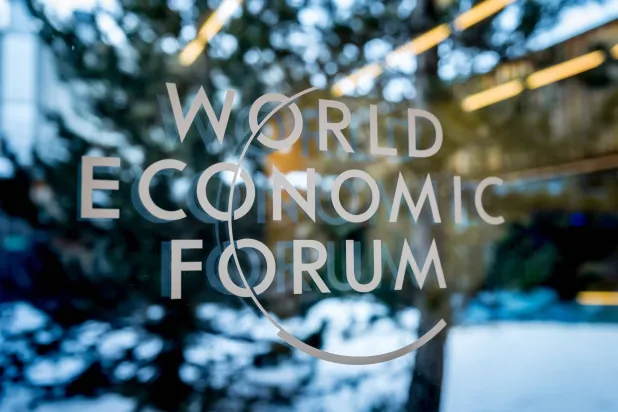 The logo of the World Economic Forum at the Davos Conference Center (AFP)