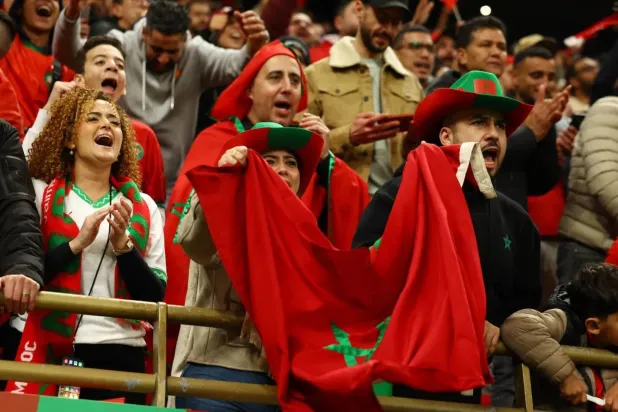 مشجعون للمنتخب المغربي خلال بطولة كأس أمم أفريقيا لكرة القدم 2025 (رويترز)