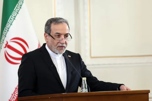 Iranian Foreign Minster Abbas Araghchi speaks during a joint press conference with the Iraqi Foreign Minister in Tehran, Iran, 18 January 2026. Hussein is in Tehran to meet with Iranian officials. (EPA)
