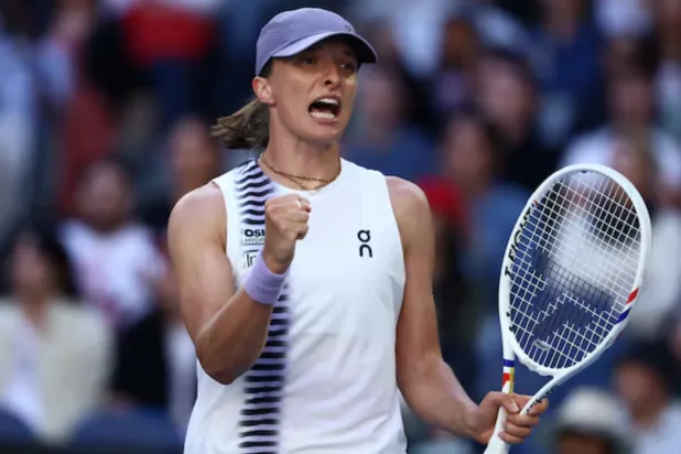 Tennis - Australian Open - Melbourne Park, Melbourne, Australia - January 22, 2026 Poland's Iga Swiatek celebrates after winning her second round match against Czech Republic's Marie Bouzkova REUTERS/Tingshu Wang 