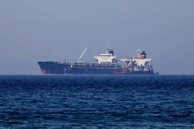 The Liberian-flagged tanker Ice Energy, chartered by the US government, takes Iranian oil from Iranian-flagged Lana (formerly Pegas) as part of a civil forfeiture action off the shore of Karystos, on the Island of Evia, Greece, May 26, 2022. REUTERS/Costas Baltas/File Photo 