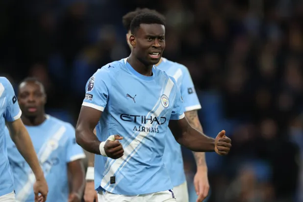 جيهي محتفلاً بالفوز على وولفرهامبتون (إ.ب.أ)