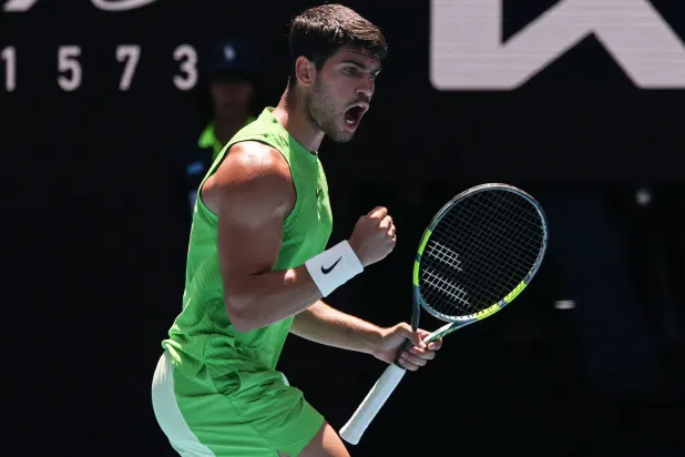  Spain's Carlos Alcaraz reacts after a point against USA's Tommy Paul during their men's singles match on day eight of the Australian Open tennis tournament in Melbourne on January 25, 2026. (AFP)