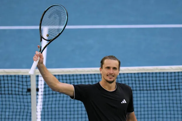 Alexander Zverev of Germany celebrates after defeating Francisco Cerundolo of Argentina in their fourth round match at the Australian Open tennis championship in Melbourne, Australia, Sunday, Jan. 25, 2026. (AP)
