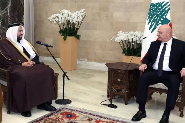 In this photo released by the Lebanese Presidency press office, Lebanese president Joseph Aoun, right, meets with Qatari Minister of State for Foreign Affairs Mohammed bin Abdulaziz Al-Khulaifi, at the presidential place in Baabda, east of Beirut, Lebanon, Monday, Jan. 26, 2026. (Lebanese Presidency press office via AP)

