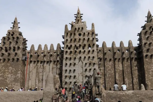 People replastered the Great Mosque of Djenne, one of Mali's major tourist draws, in June 2025. OUSMANE MAKAVELI / AFP/File
