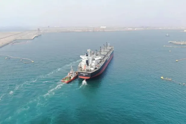 A vessel carrying an export shipment departs Jazan Port (SPA). 