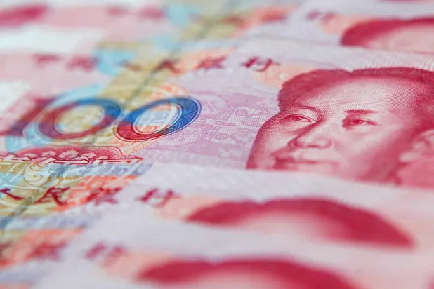 FILE PHOTO: Chinese 100 yuan banknotes are seen in this picture illustration created in Shanghai on January 17 , 2011. REUTERS/Carlos Barria/File Photo