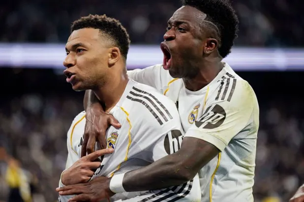  Soccer Football - LaLiga - Real Madrid v Rayo Vallecano - Santiago Bernabeu, Madrid, Spain - February 1, 2026 Real Madrid's Kylian Mbappe celebrates scoring their second goal with Vinicius Junior. (Reuters)