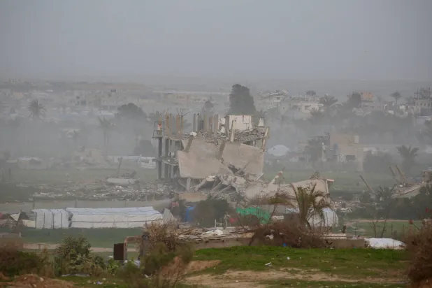 A general view of destroyed buildings near the Nuseirat camp for Palestinian refugees in the central Gaza Strip on January 31, 2026. (AFP)