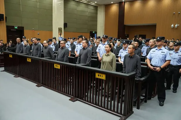 Members of the Ming family criminal organization appearing in court in Zhejiang Province, eastern China (AFP)