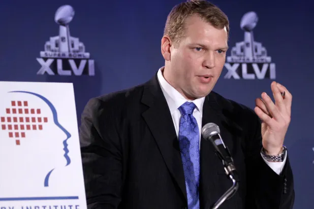 In this Feb. 3, 2012, file photo, Chris Nowinski, head of the Sports Legacy Institute in Boston, talks about a hit count proposal to dramatically reduce youth athletes' exposure to repetitive brain trauma in multiple sports during a news conference at the Super Bowl XLVI media center in Indianapolis. (AP)