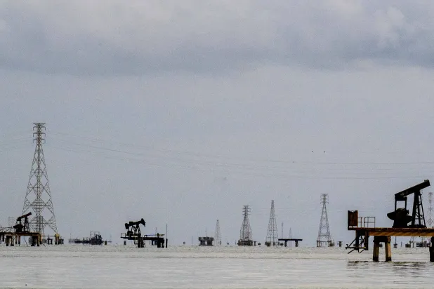 This image shows oil rigs in Cabimas, south of Lake Maracaibo, Zulia State, Venezuela, on January 31, 2026. (AFP)