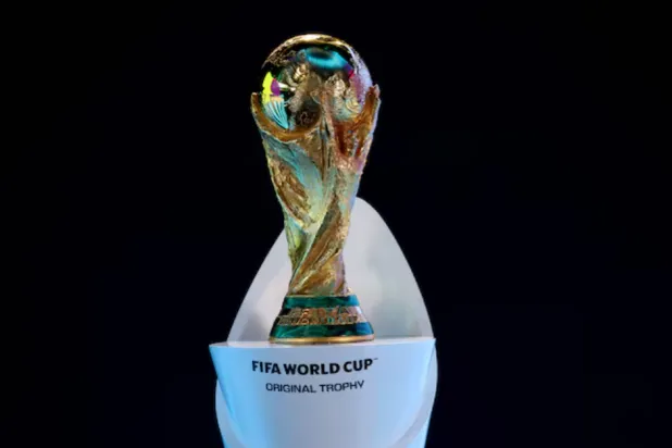 Soccer Football - World Cup Playoff Tournament and European Playoff draws - FIFA Headquarters, Zurich, Switzerland- November 20, 2025 The original FIFA World Cup trophy is kept on display during the draws REUTERS/Denis Balibouse 