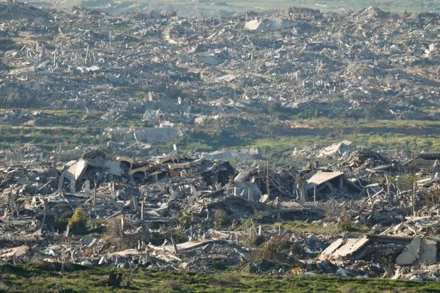  Rubble from destroyed buildings lies in the north of Gaza, as seen from the Israeli side of the Israel-Gaza border in Israel, February 4, 2026. (Reuters)