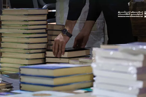 الحكومة السورية تمنع ​عرض كتاب مرتبط بتنظيم «القاعدة» (صورة من حساب معرض دمشق الدولي للكتاب على إكس)