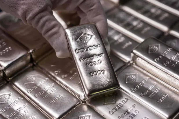 Silver bars weighing 500 grams are displayed at the Austrian Gold and Silver Refinery (Oegussa) in Vienna, Austria, on February 3, 2026. (Photo by GEORG HOCHMUTH / APA / AFP) / Austria OUT
