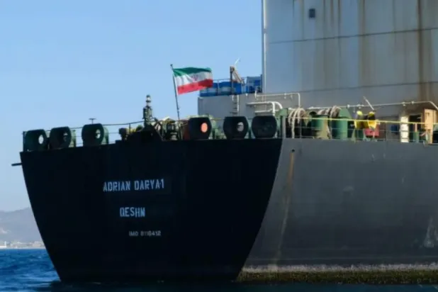 In this photo taken on August 18, 2019, an Iranian flag flutters on board an oil tanker that entered Syria’s Baniyas Port. (AFP File Photo)
