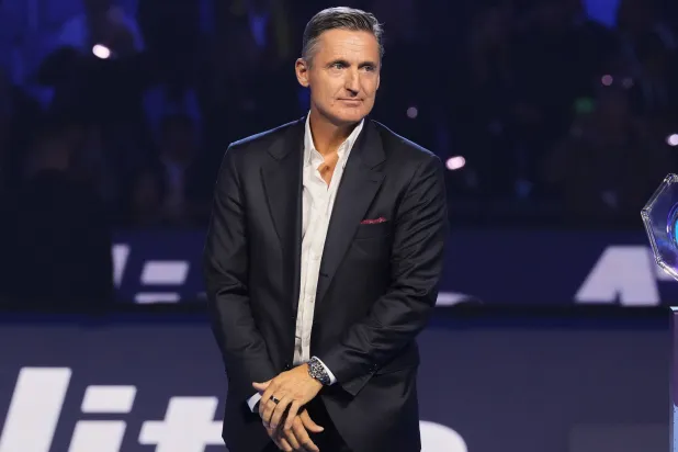 FILE - ATP President Andrea Gaudenzi stands at the end of the singles tennis final match of the ATP World Tour Finals, in Turin, Italy, Nov. 16, 2025. (AP Photo/Antonio Calanni, File)