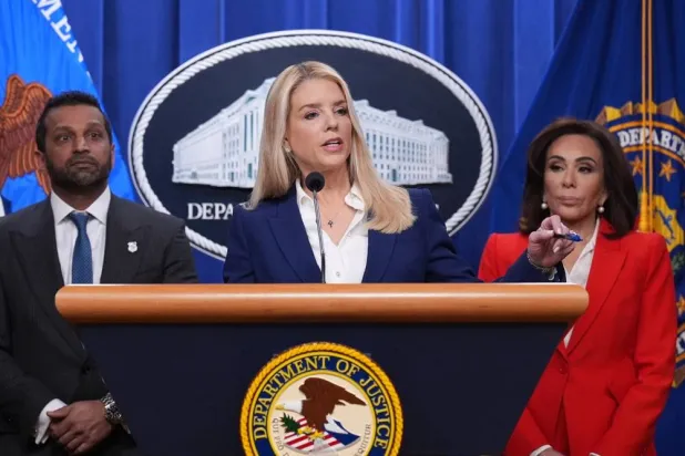 Attorney General Pam Bondi, center, flanked by FBI Director Kash Patel, left, and Jeanine Pirro, US Attorney for the District of Columbia, appears before reporters at the Justice Department, Friday, Feb. 6, 2026, in Washington, to announce the capture of a key participant in the 2012 attack on a US compound that killed four Americans in Benghazi, Libya. (AP) 