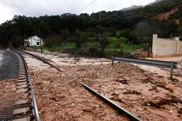  A mountain landslide blocks railway tracks during heavy rains, as storm Leonardo hits parts of Spain, in Benaojan, Spain, February 6, 2026. (Reuters)