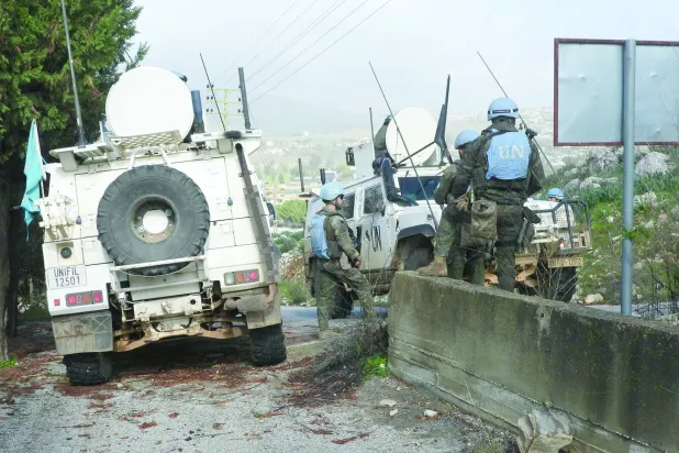 United Nations Spanish UNIFIL forces arrive to inspect chalets, after the Israeli army reportedly booby-trapped and blew them up at dawn, on the outskirts of the town of al-Khiam, southern Lebanon on January 31, 2026. (Photo by Rabih DAHER / AFP)