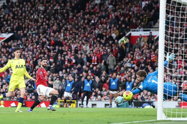 Bruno Fernandes of Manchester United scores the 2-0 goal during the English Premier League match between Manchester United and Tottenham Hotspur, in Manchester, Britain, 07 February 2026. (EPA)
