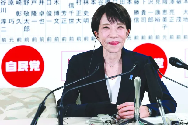 TOPSHOT - Japan's Prime Minister and President of the Liberal Democratic Party (LDP) Sanae Takaichi reacts as she speaks with media on the House of Representatives election day at the LDP headquarters in Tokyo on February 8, 2026. (Photo by Kim Kyung-Hoon / POOL / AFP)