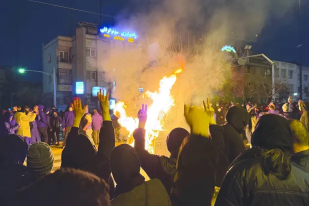 FILE - In this photo obtained by The Associated Press, Iranians attend an anti-government protest in Tehran, Iran, Jan. 9, 2026. (UGC via AP, File)