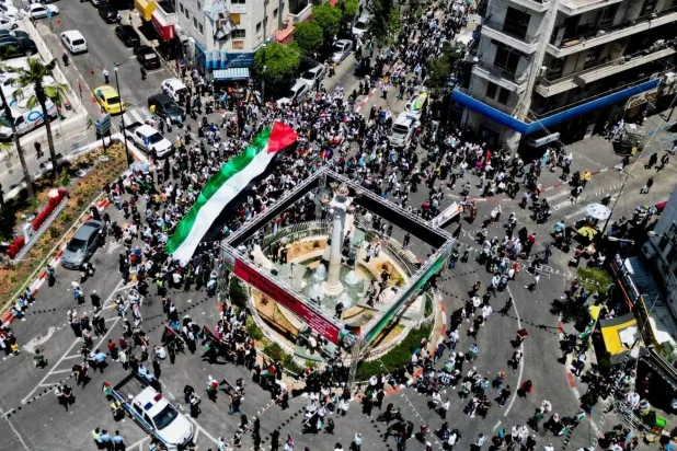 خلال مسيرة فلسطينية في رام الله بالضفة الغربية (رويترز - أرشيفية)