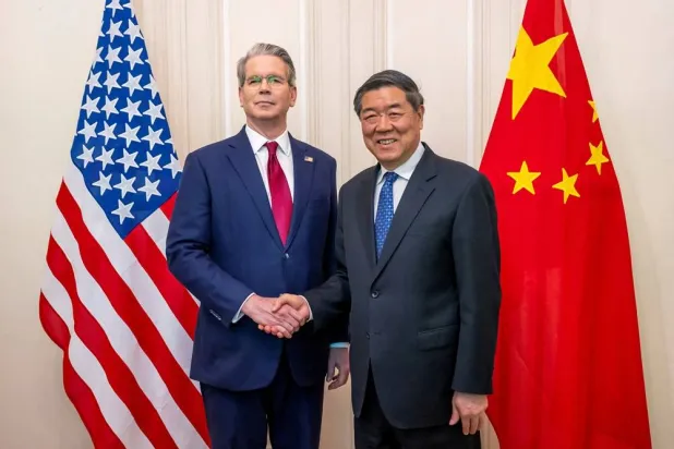 US Secretary of the Treasury Scott Bessent, left, shakes hands with Chinese Vice Premier He Lifeng, right, during a bilateral meeting between the United States and China, in Geneva, Switzerland, on Saturday, May 10, 2025. (KEYSTONE/EDA/Martial Trezzini) /Handout via Reuters